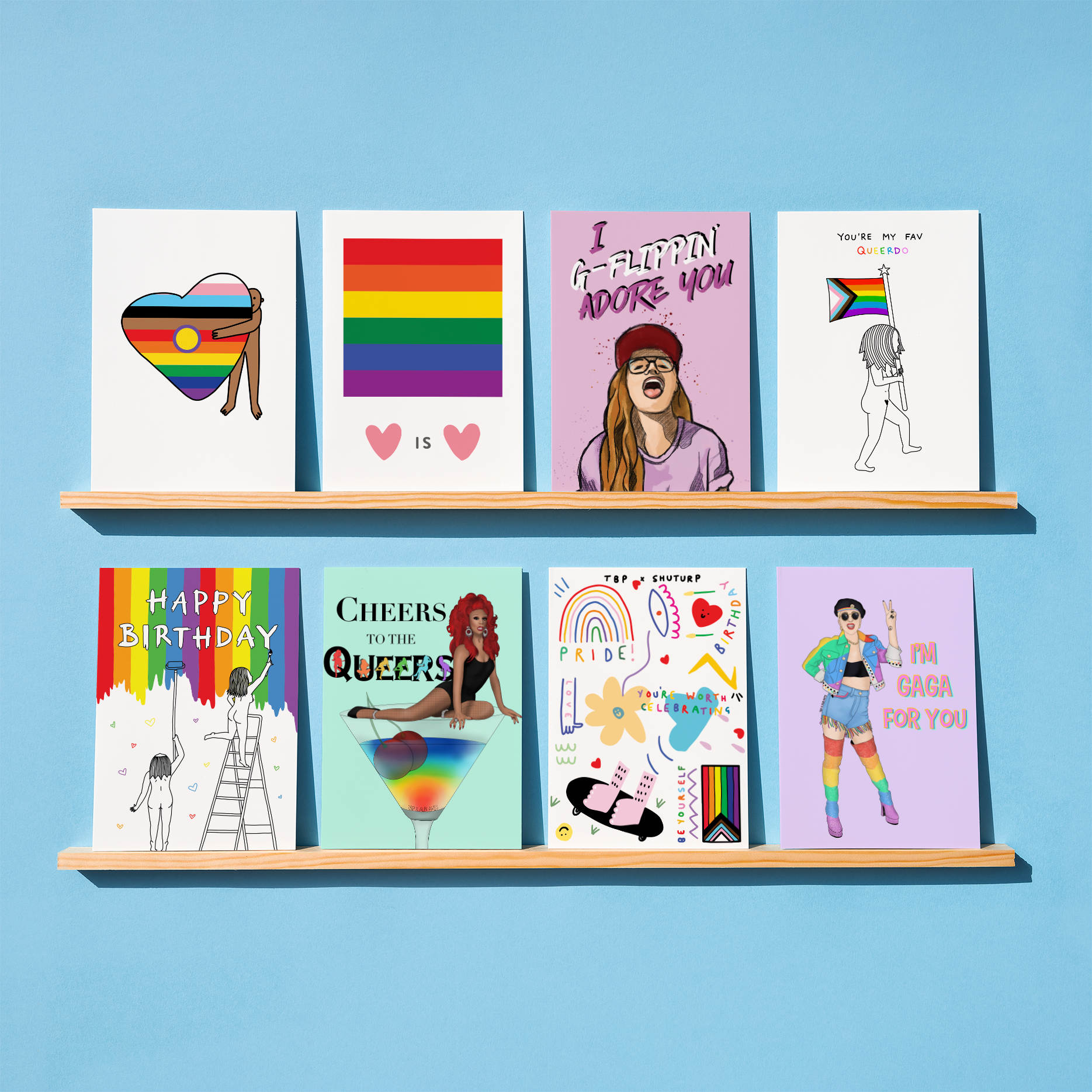 8 Inclusive LGBTQIAP2S+ Greeting Cards on two shelves