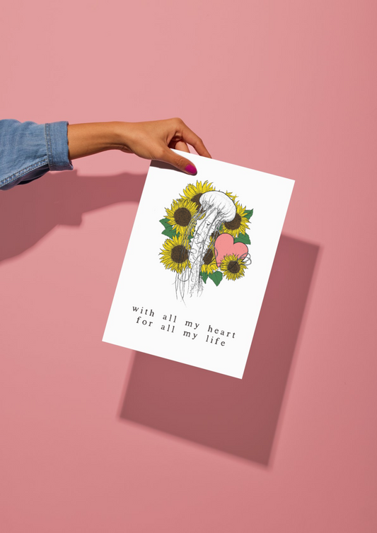 Woman holding With All My Heart A4 Print Collaboration by Two Brides Presents and Australian Author Courtney Peppernell