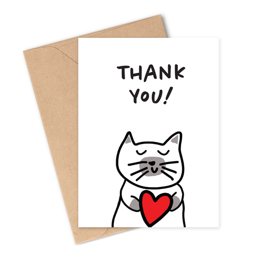 Greeting card with a cat holding a big red heart and 'THANK YOU!' text, accompanied by a kraft envelope.