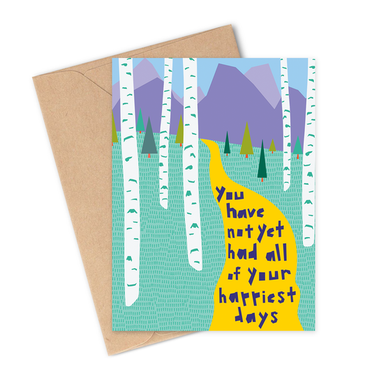 Greeting card with a yellow path through a forest and motivational text, featuring a brown envelope.