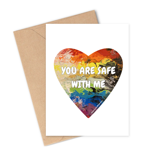 Colourful progress pride flag coloured heart-shaped card with 'You are safe with me' text on a white background